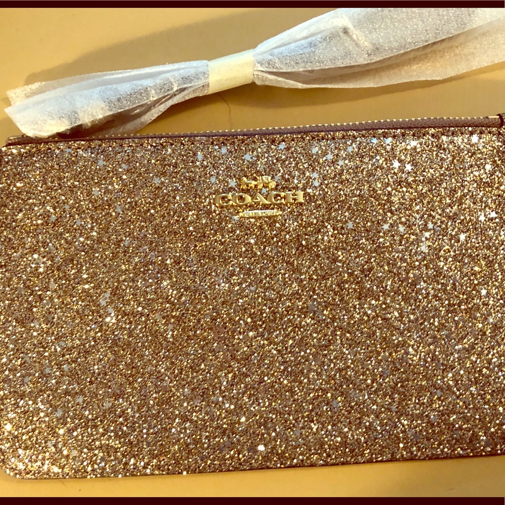 New gold Coach wristlet